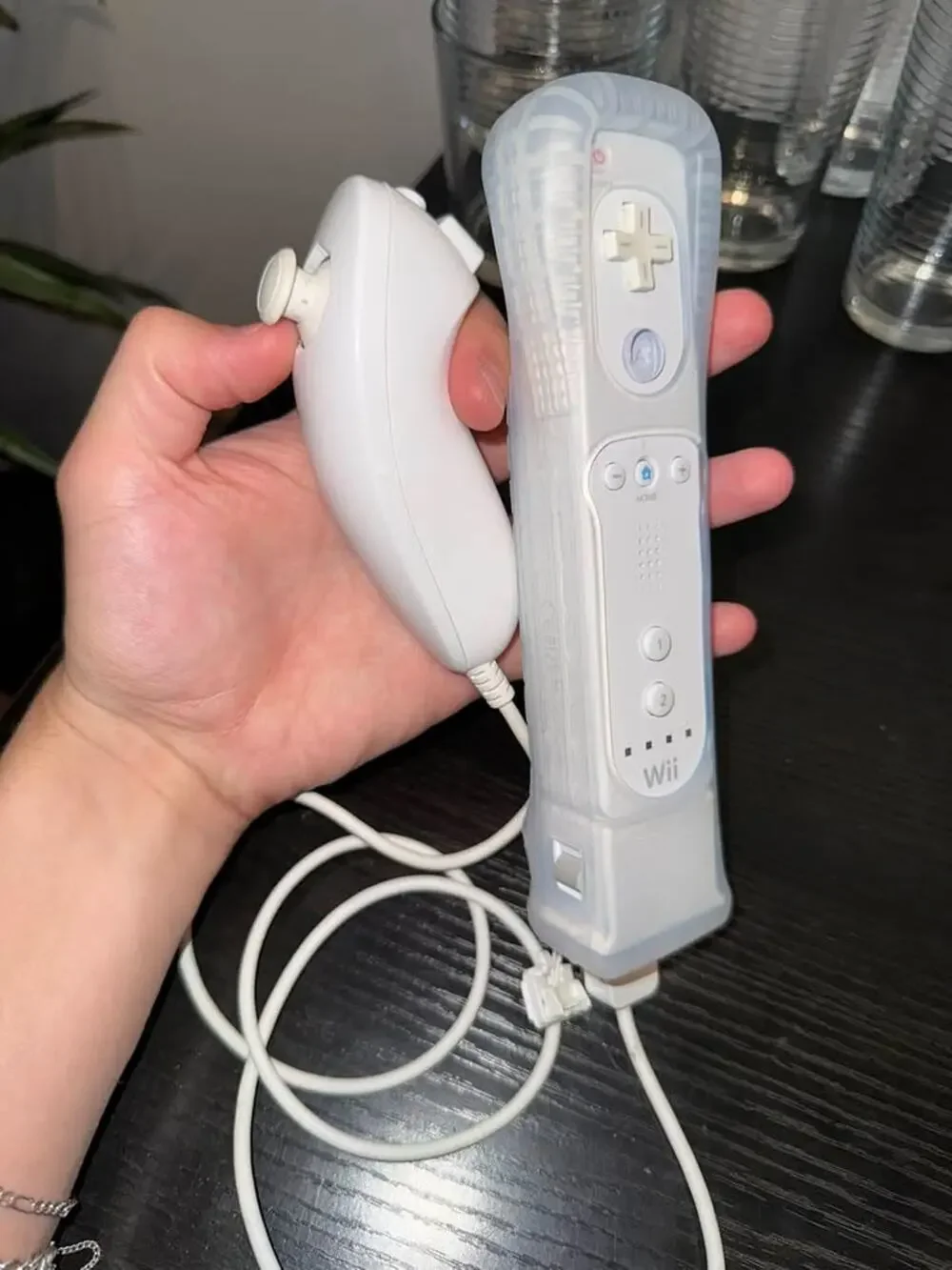 Nintendo Wii Remote with Nunchuk and Wii MotionPlus Adapter